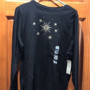 Long sleeved shirt with snowflake design.